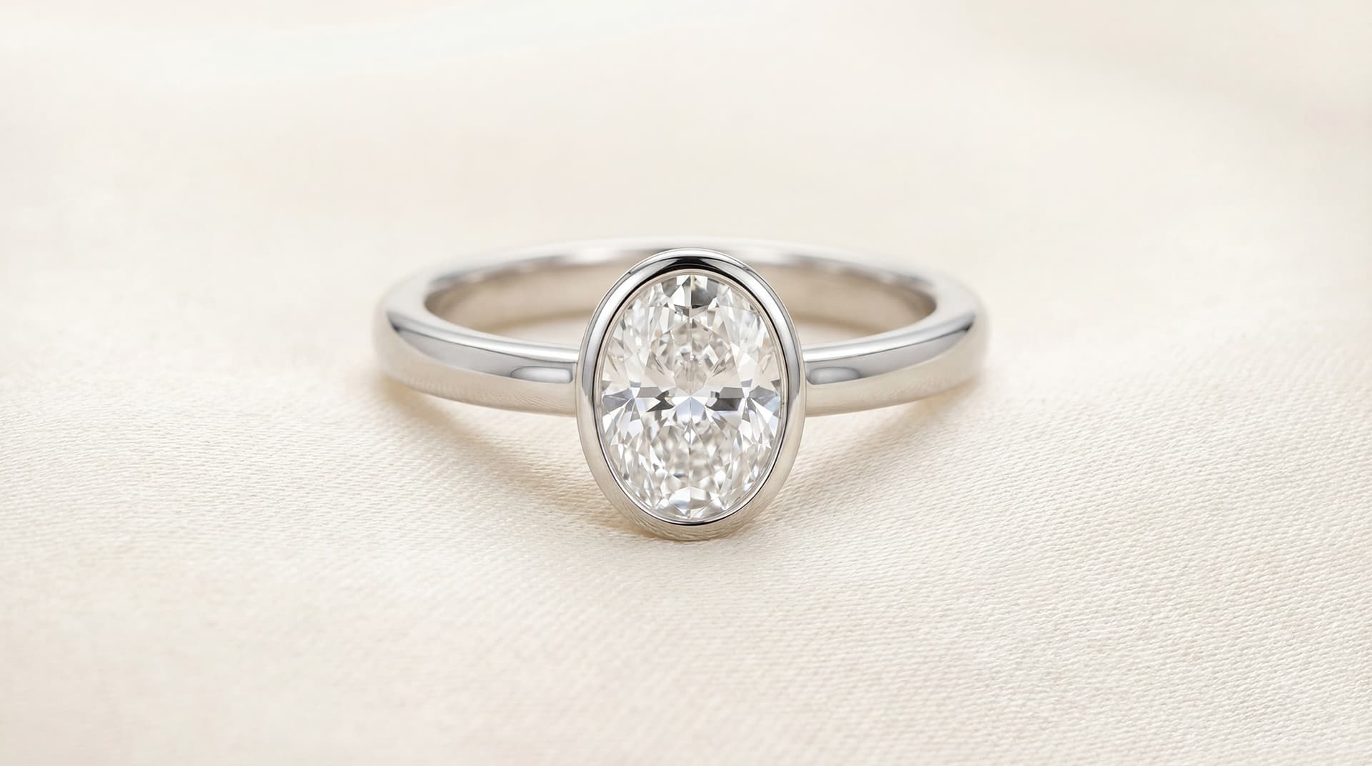 Diamond engagement ring with modern bezel-style setting — Gold & Diamond Company, Fayetteville