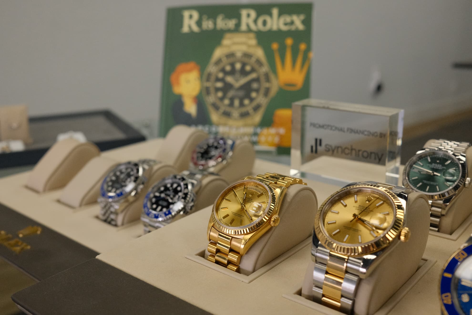 Pre-owned Rolex Day-Date, GMT-Master II, and Milgauss on display at Gold & Diamond Company Rogers AR