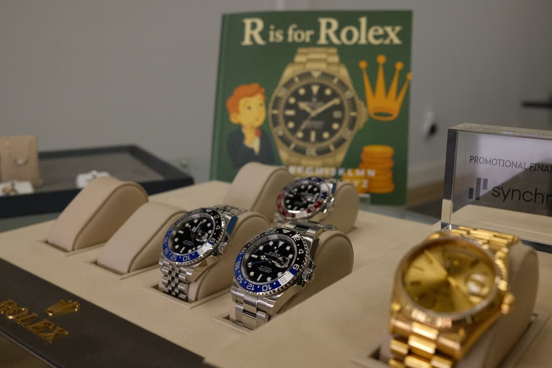 Pre-owned Rolex GMT-Master II Batman and Pepsi on display at Gold & Diamond Company Rogers, AR